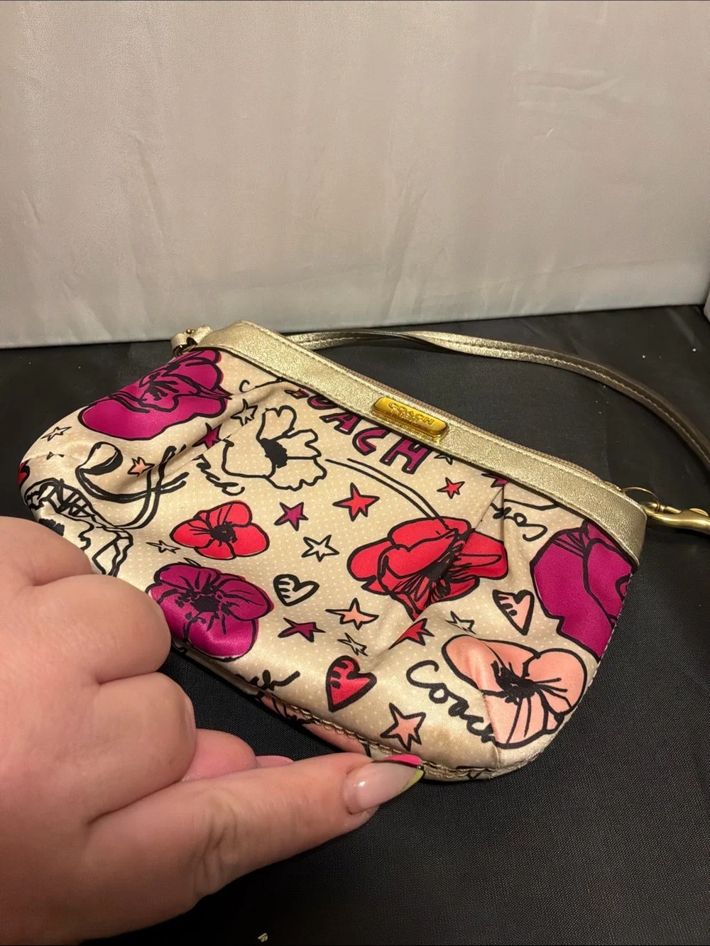 Coach graffiti wristlet